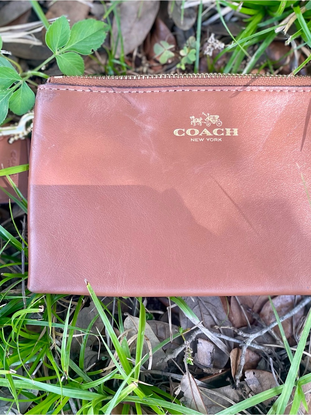 Coach Leather wristlet in Chestnut Brown with Gold Logo